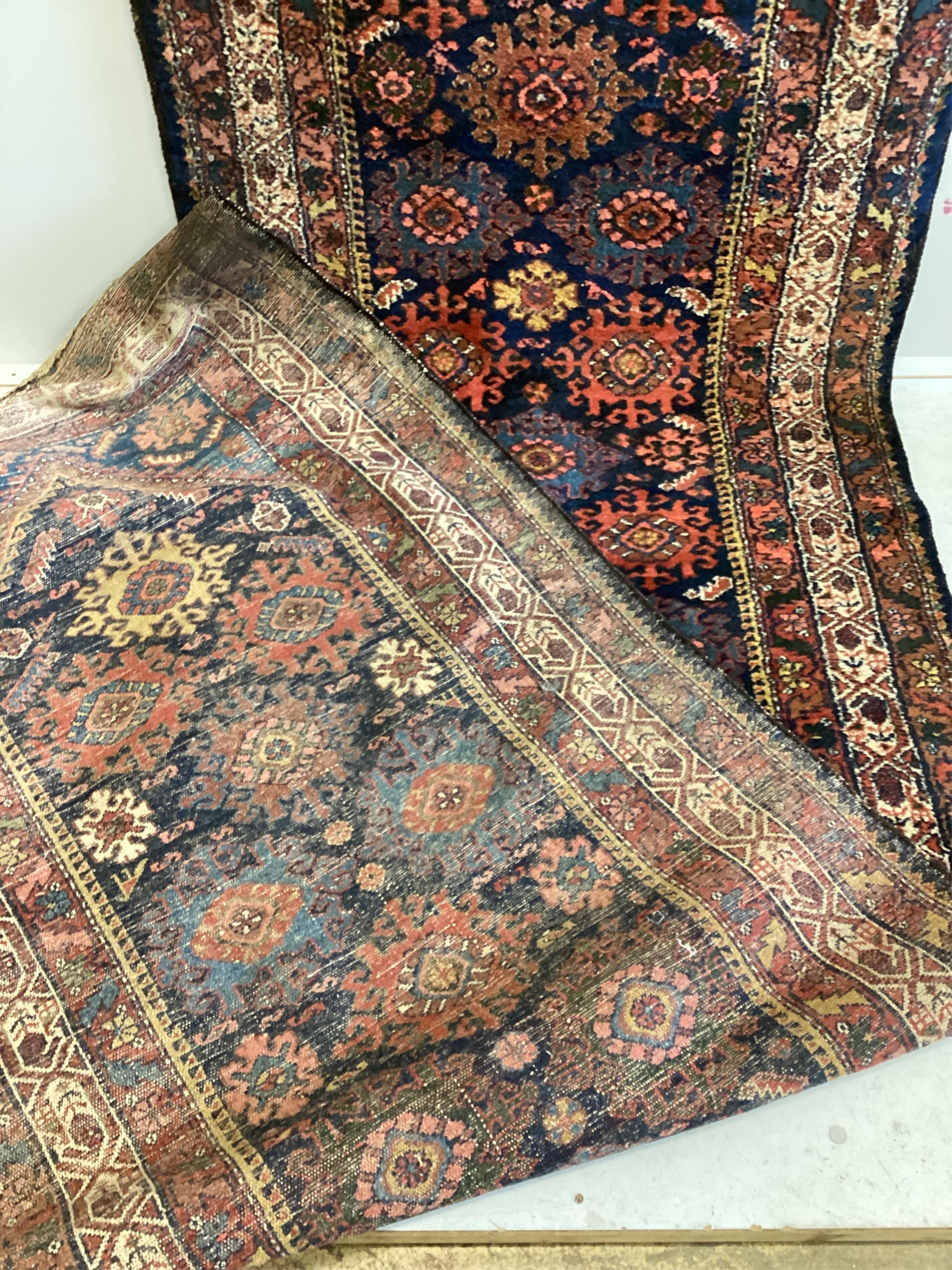 A North West Persian blue ground runner, 480 x 98cm. Condition - fair